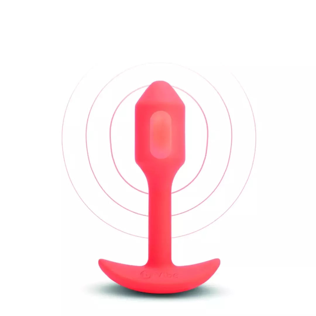 b-Vibe Vibrating Snug Plug 1 Orange – 62 g svorį turintis silikoninis modelis