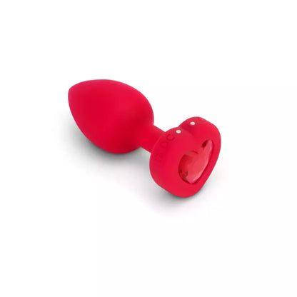 b-Vibe Heart Vibrating Remote Plug M/L raudonas – 15 režimų, silikoninis, USB