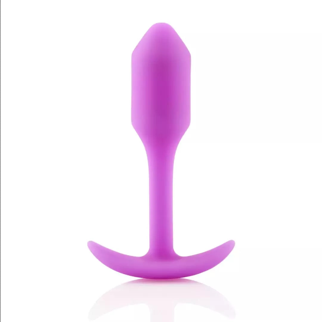 b-Vibe Snug Plug 1 Fuchsia pasunkintas silikoninis analinis kaištis 2x9,4 cm