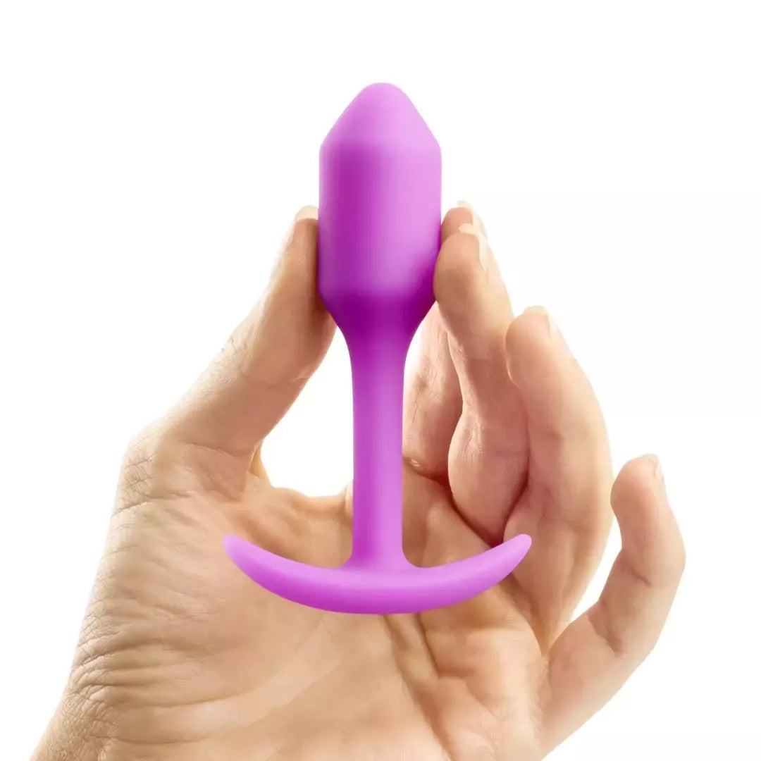 b-Vibe Snug Plug 1 Fuchsia pasunkintas silikoninis analinis kaištis 2x9,4 cm