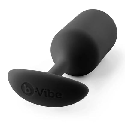 B-Vibe Snug Plug 3 juodos spalvos analinis kamštis su svoriu, silikoninis, 180g, 3,6x12,7 cm
