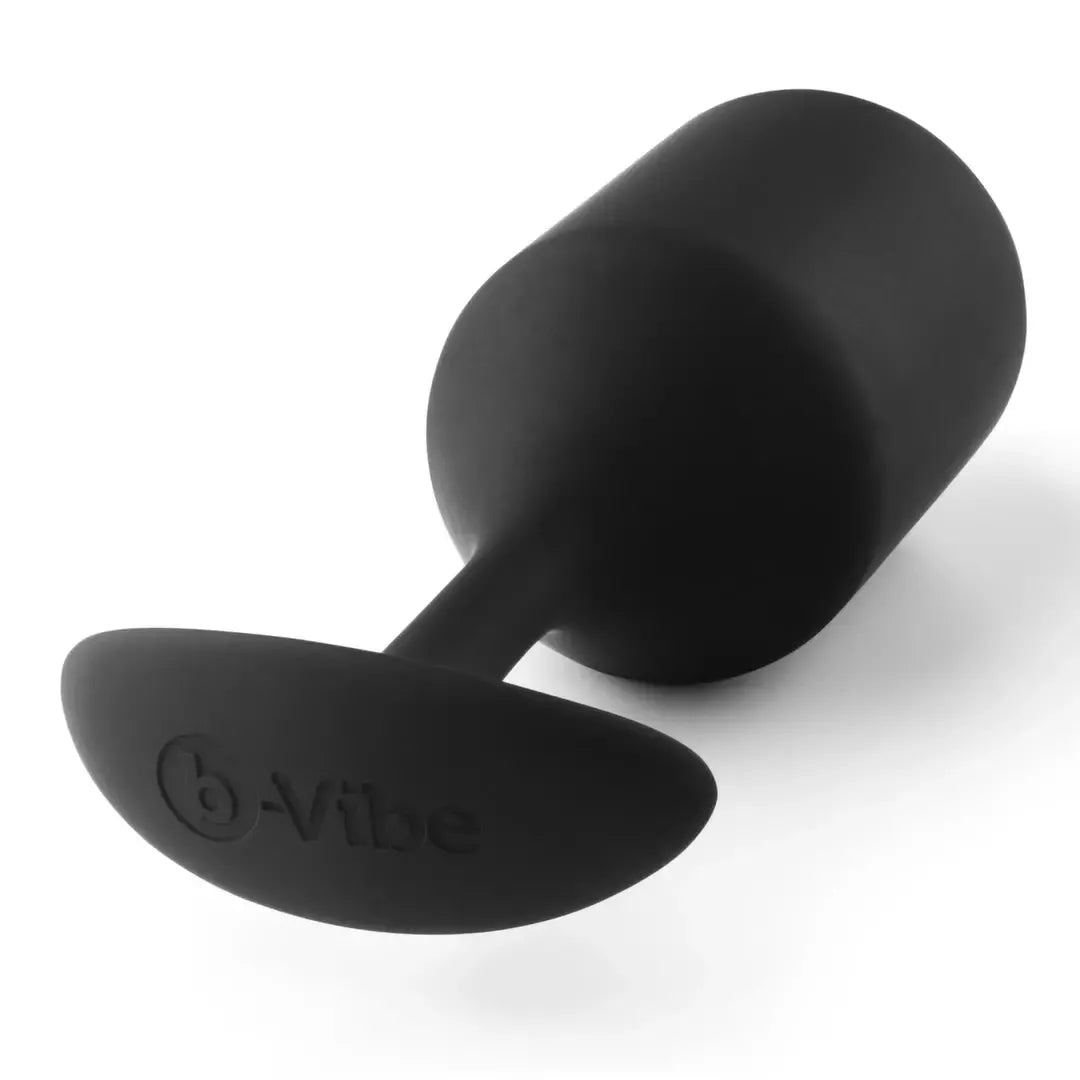b-Vibe Snug Plug 4 juodas sveriantis silikoninis kamštis 257g 4,3x14cm
