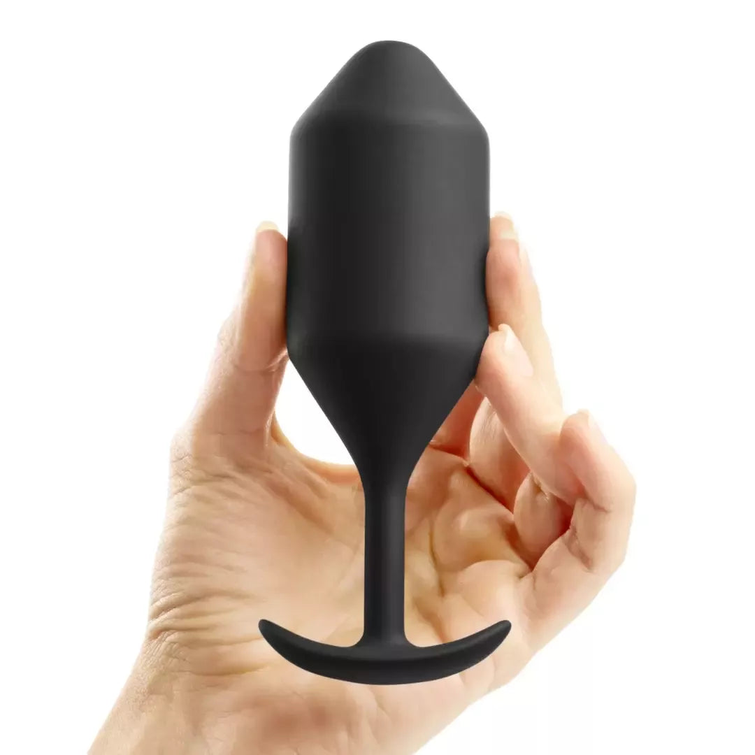 b-Vibe Snug Plug 4 juodas sveriantis silikoninis kamštis 257g 4,3x14cm