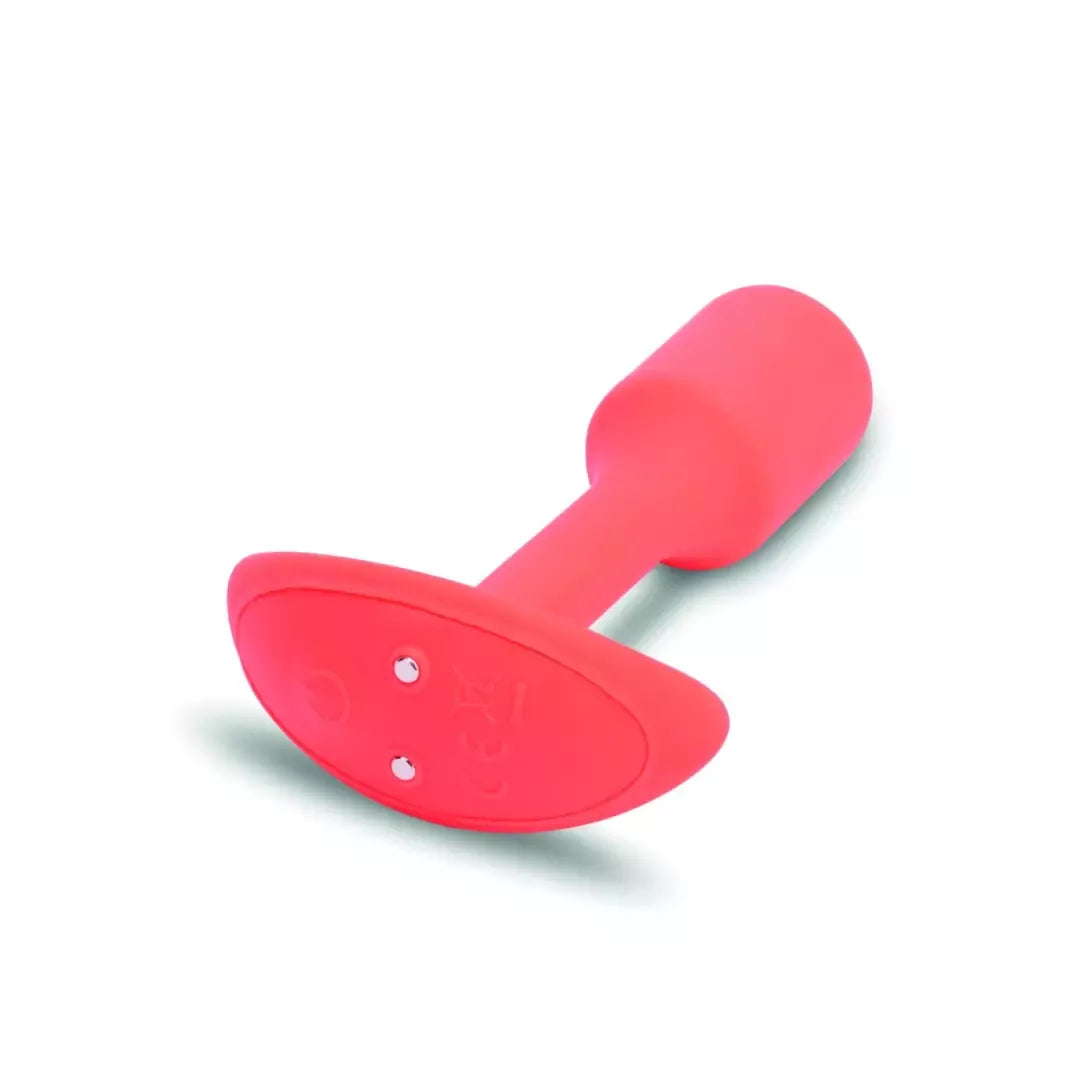 b-Vibe Vibrating Snug Plug 1 Orange – 62 g svorį turintis silikoninis modelis
