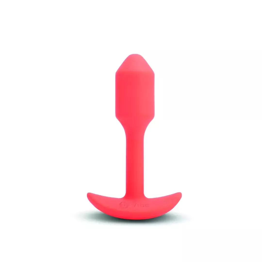 b-Vibe Vibrating Snug Plug 1 Orange – 62 g svorį turintis silikoninis modelis