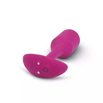b-Vibe Vibrating Snug Plug 2 Rose – vidutinio dydžio svertinis silikoninis analinis kamštis