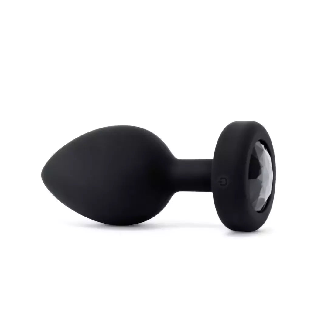 „b-Vibe“ vibruojantis brangakmeniu puoštas XXL dydžio kamštis, juodas – 15 režimų, kraunamas per USB, 12,2 cm