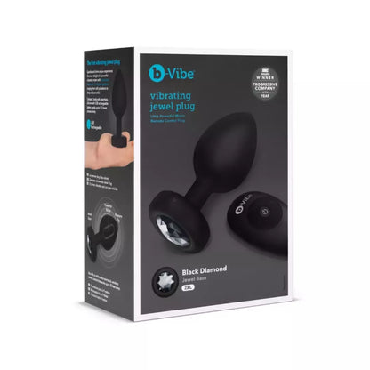„b-Vibe“ vibruojantis brangakmeniu puoštas XXL dydžio kamštis, juodas – 15 režimų, kraunamas per USB, 12,2 cm