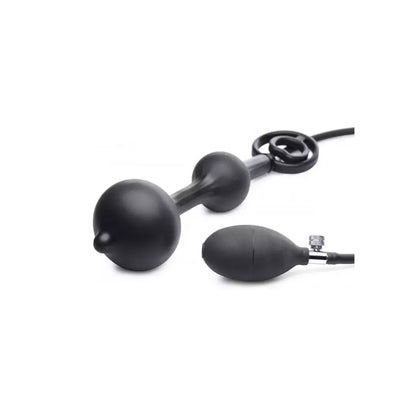 XR Brands Master Series Devils Rattle pripučiamas silikoninis kamštis su dvigubu žiedu